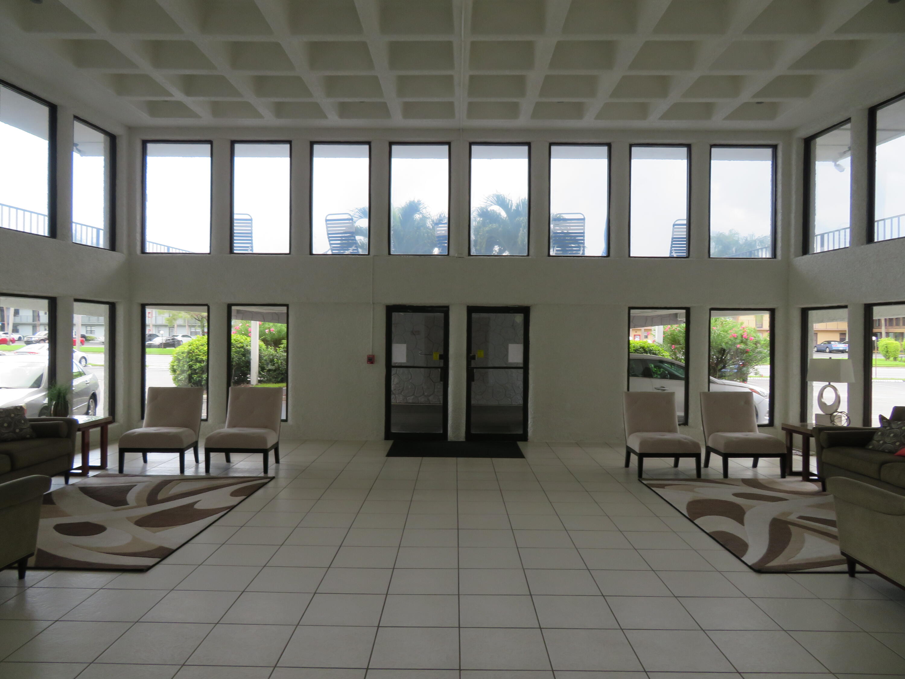 9233 Southwest 8th Street, Unit 207 Boca Raton, FL 33428 - Photo 10 of 42 16_9233_Bldg._Lobby