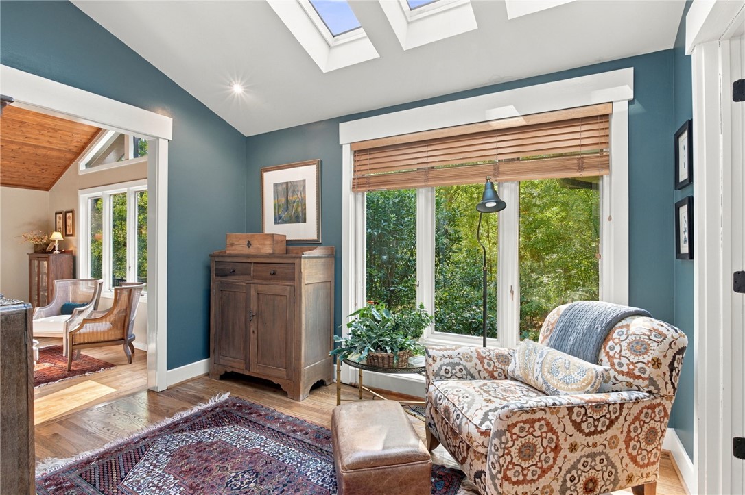 604 Ridgecrest Drive Clemson, SC 29631 - Photo 28 of 50 Natural light pours through dual skylights into this inviting space with hardwood flooring.