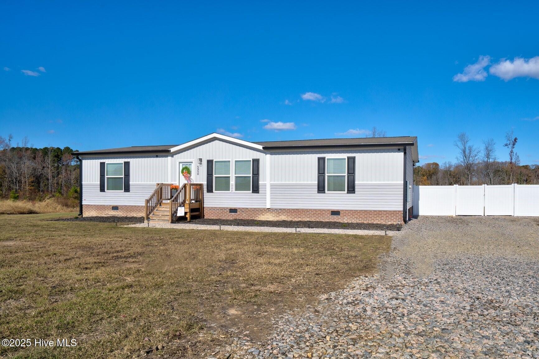 5950 West Mt Road Rocky Mount, NC 27803 - Photo 2 of 36 Home features large parking area.