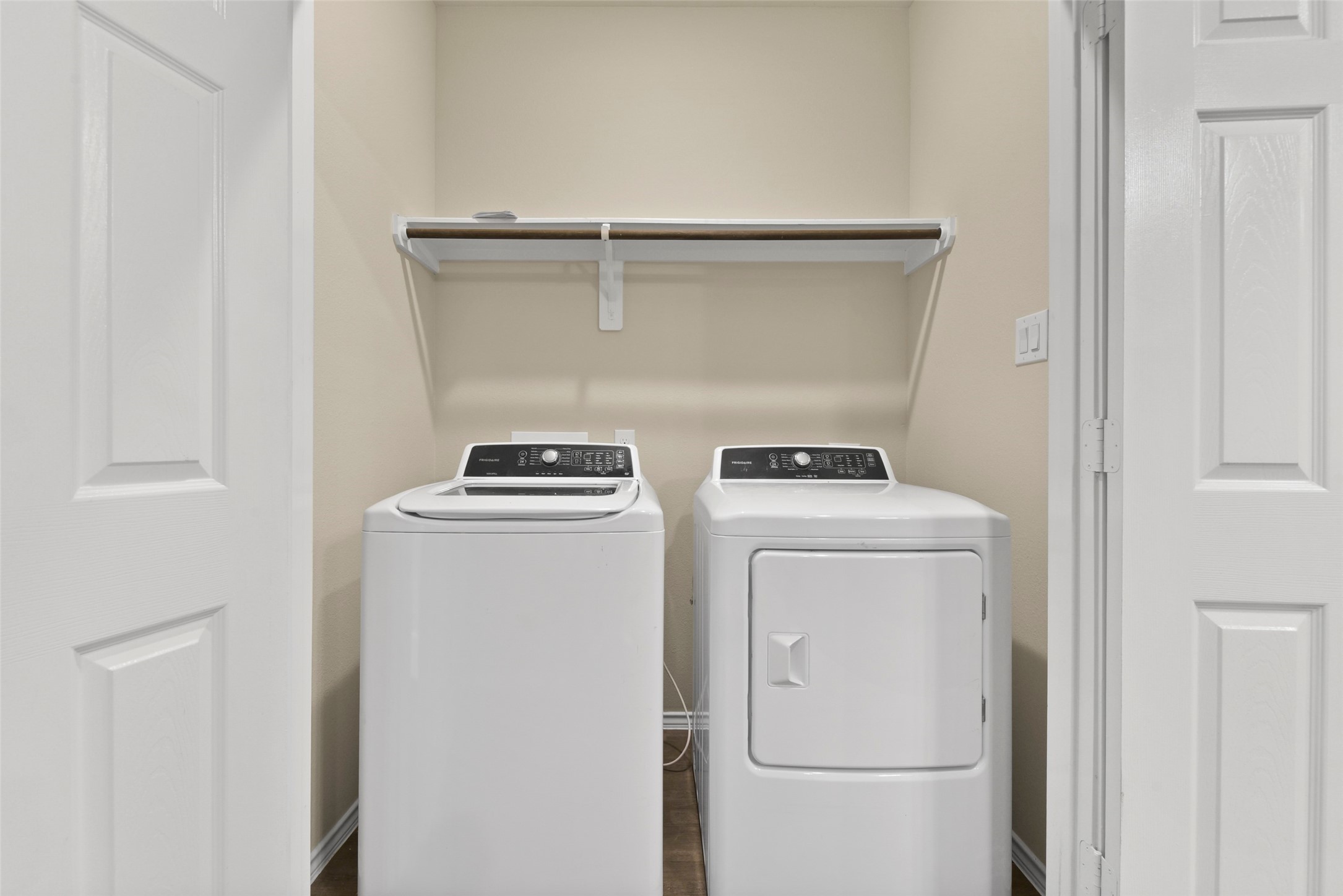 9650 Warm Spring Willis, TX 77318 - Photo 19 of 26 a utility room with dryer and washer