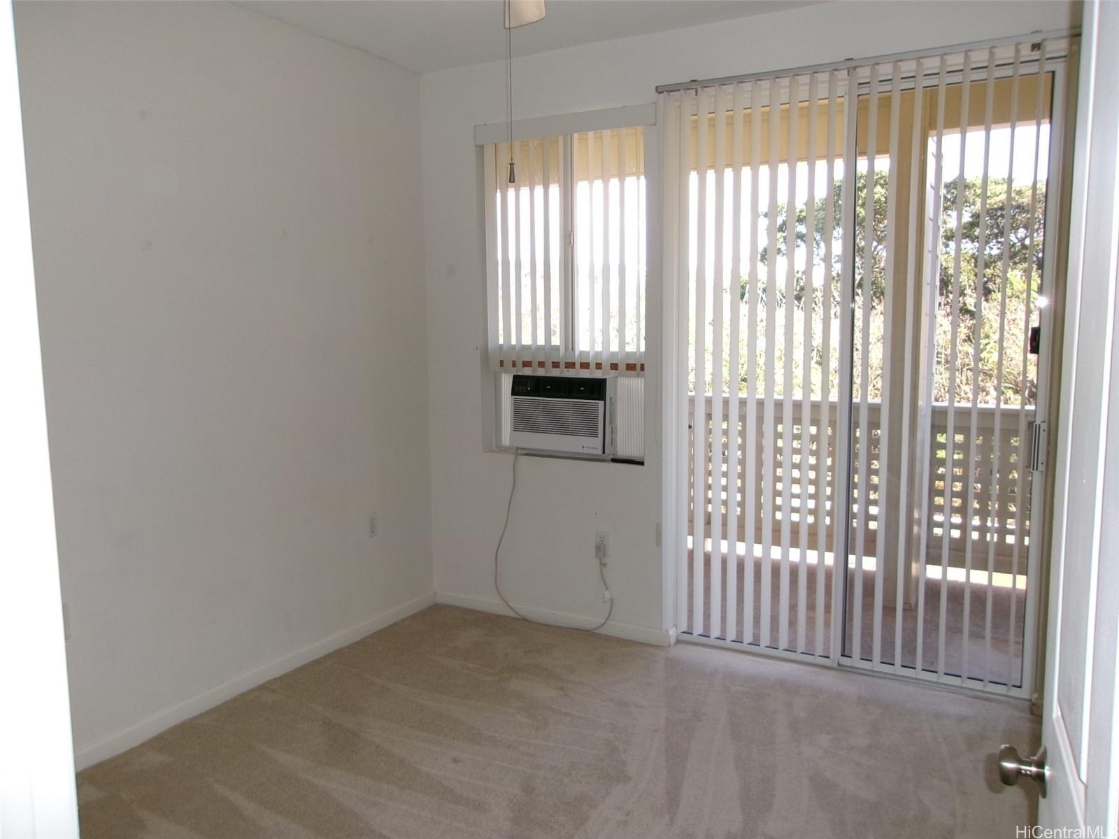 1337 Moanalualani Way, Unit 11H Honolulu, HI 96819 - Photo 12 of 19 a view of a livingroom with a porch