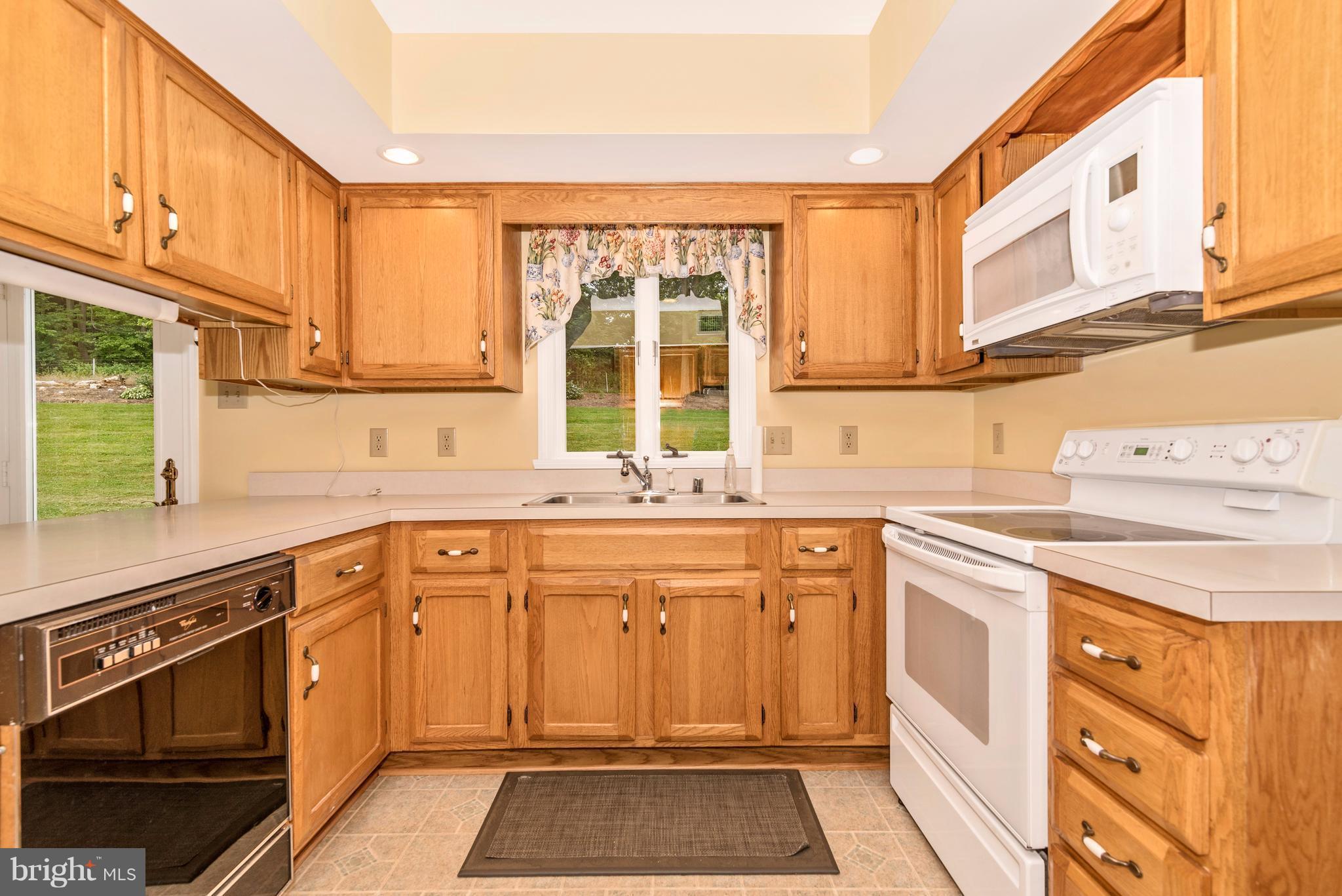 3623 Fry Road Jefferson, MD 21755 - Photo 20 of 30 a kitchen with a sink stove and cabinets