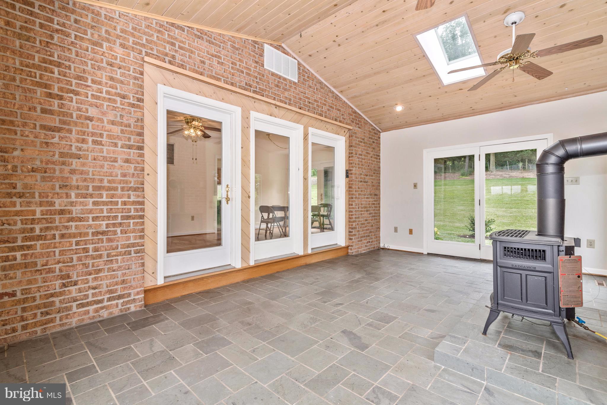 3623 Fry Road Jefferson, MD 21755 - Photo 23 of 30 a view of an empty room with a fireplace