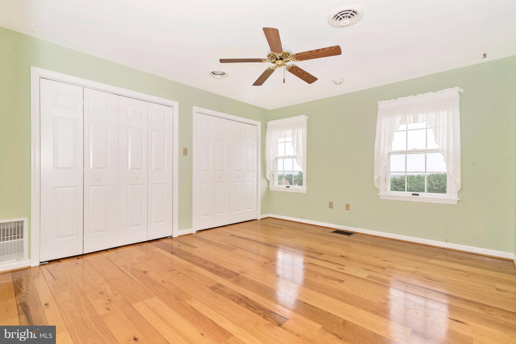 3623 Fry Road Jefferson, MD 21755 - Photo 25 of 30 a view of a livingroom with a ceiling fan and window