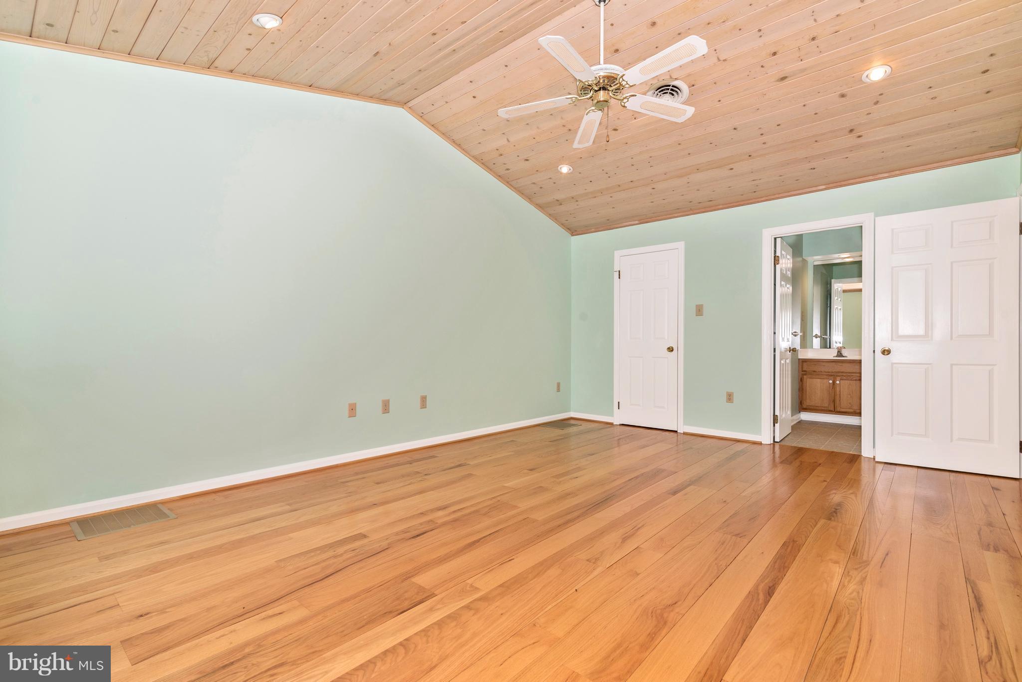3623 Fry Road Jefferson, MD 21755 - Photo 27 of 30 wooden floor in an empty room with a window