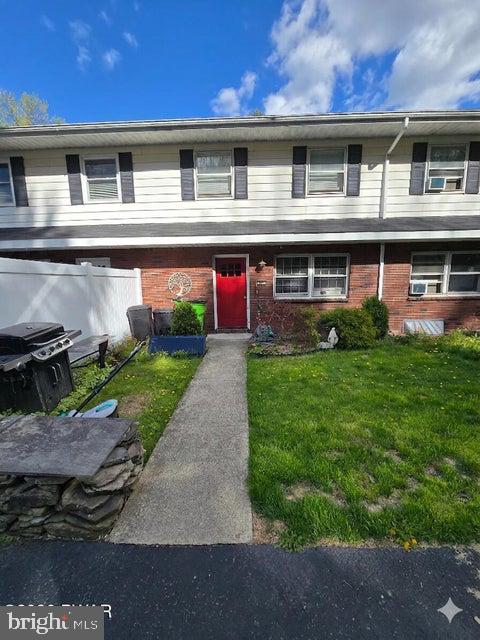 107 Keystone Hls Road, Unit 404 Factoryville, PA 18419 - Photo 1 of 27 Charming home with vibrant red door.