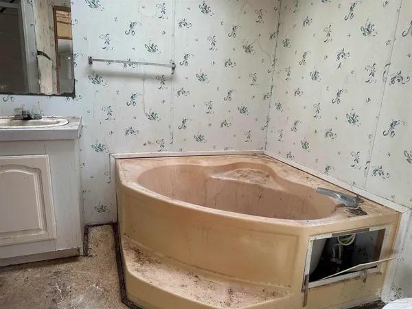 a bathroom with a bathtub