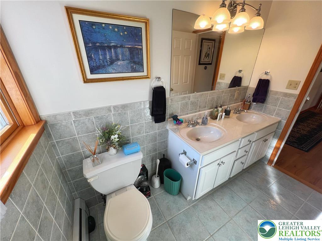 90 Halina Way Kunkletown, PA 18058 - Photo 21 of 32 a bathroom with a sink mirror and toilet