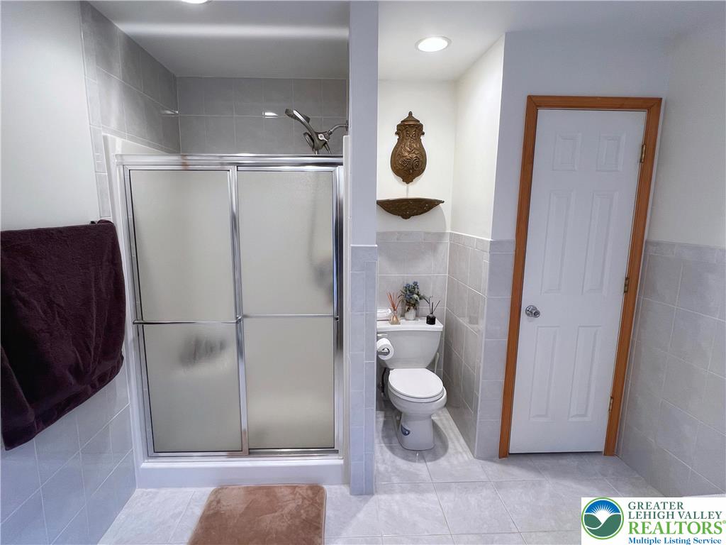 90 Halina Way Kunkletown, PA 18058 - Photo 25 of 32 a bathroom with a sink and a mirror