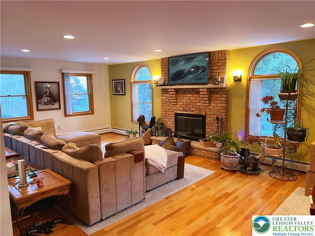 90 Halina Way Kunkletown, PA 18058 - Photo 8 of 32 a living room with furniture fireplace and flat screen tv