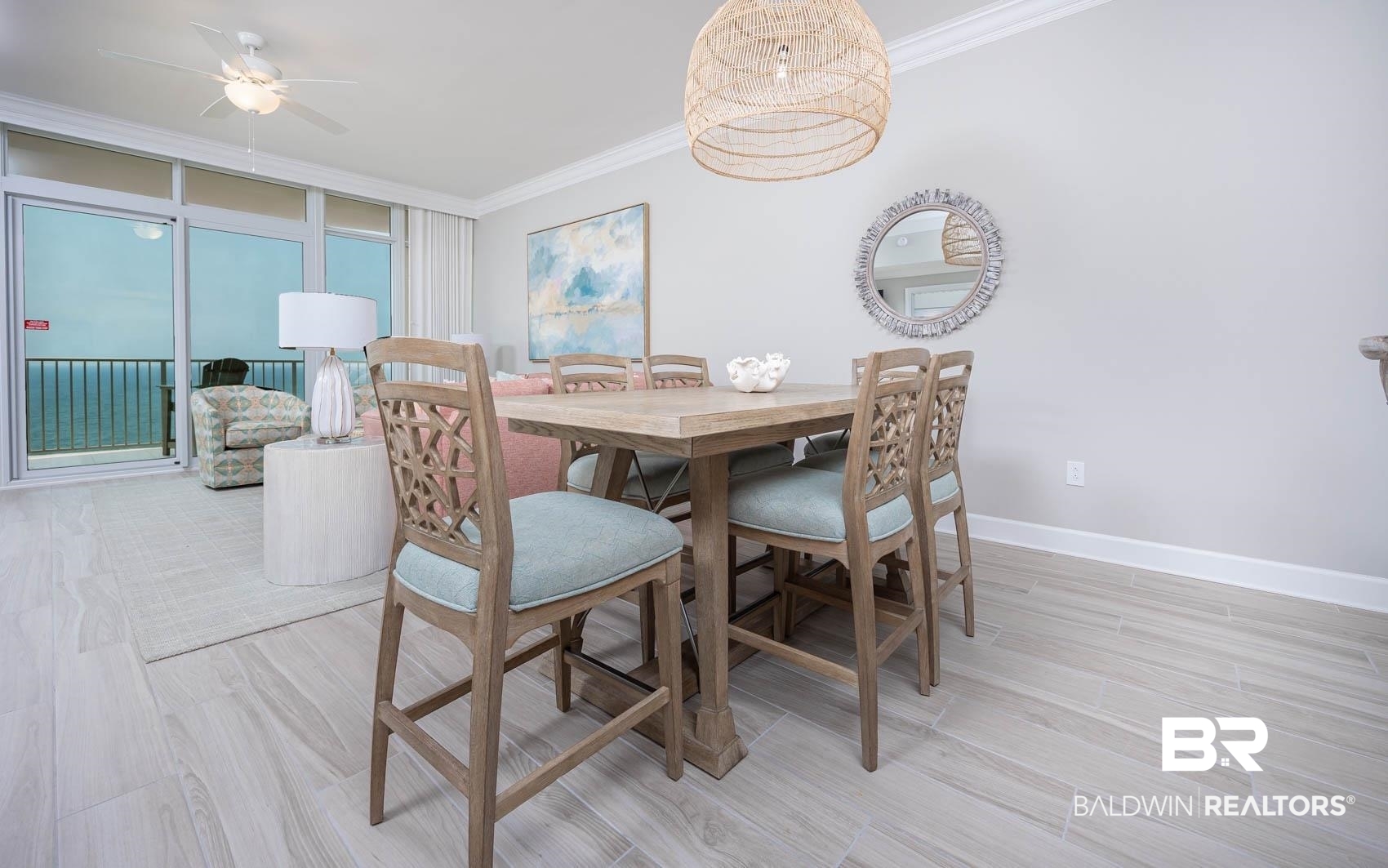 23008 Perdido Beach Boulevard, Unit 2003 Orange Beach, AL 36561 - Photo 5 of 35 Dining room featuring ornamental molding and ceiling fan