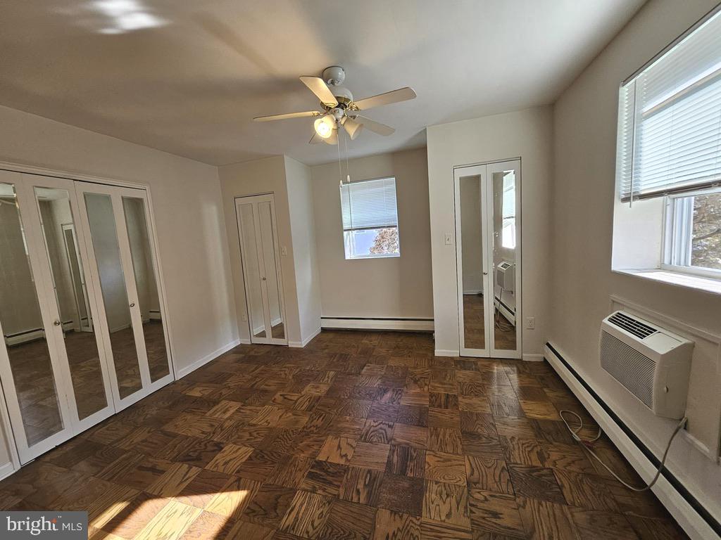 412 North Wayne Avenue, Unit 203 Wayne, PA 19087 - Photo 16 of 21 a view of an empty room and window