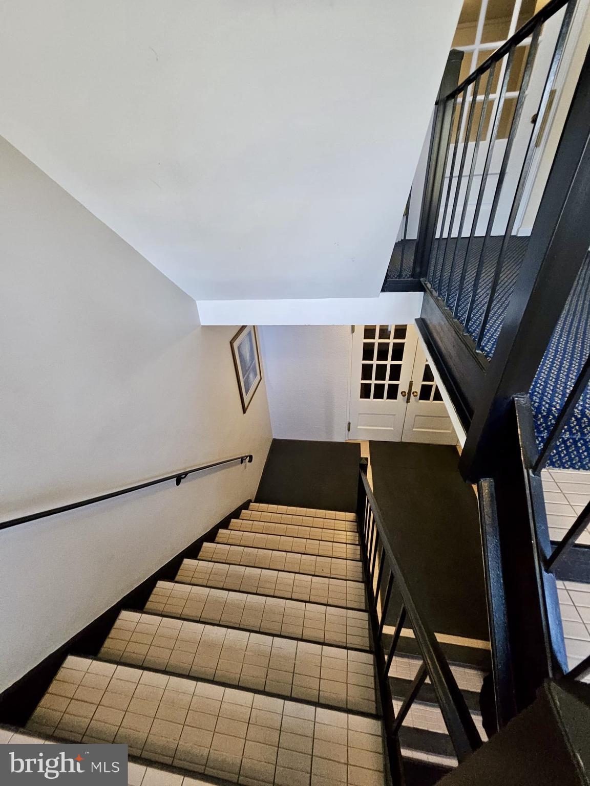 412 North Wayne Avenue, Unit 203 Wayne, PA 19087 - Photo 19 of 21 a view of an entryway with wooden floor