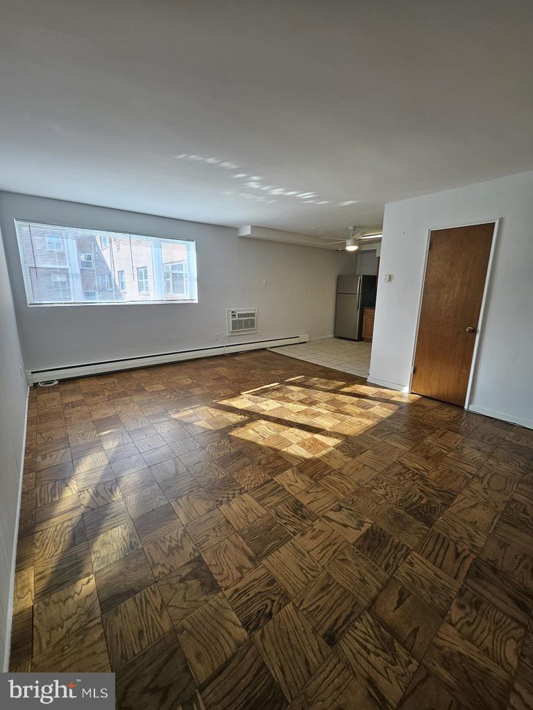 412 North Wayne Avenue, Unit 203 Wayne, PA 19087 - Photo 7 of 21 a view of an empty room