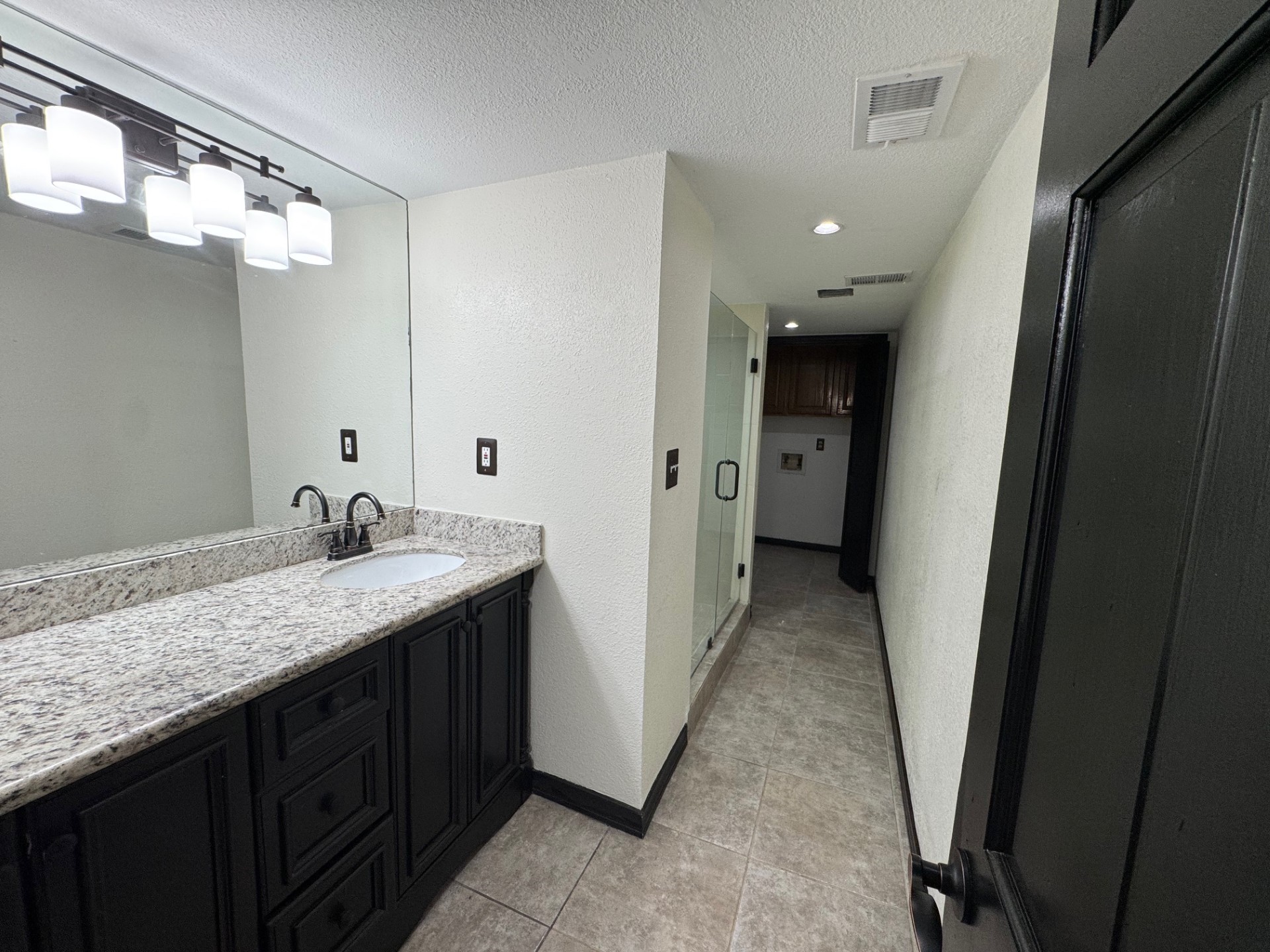 7716 Champion Pines Drive Spring, TX 77379 - Photo 15 of 17 M. Bath showing Utility Rm beyond