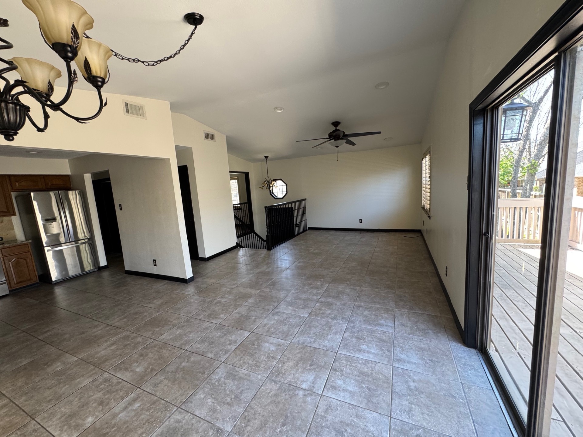 7716 Champion Pines Drive Spring, TX 77379 - Photo 6 of 17 Open Kitchen, Dining & Living area