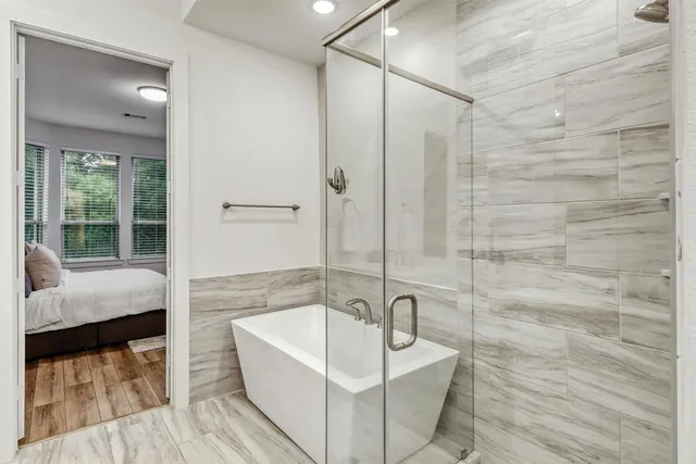 a bathroom with a sink and a shower
