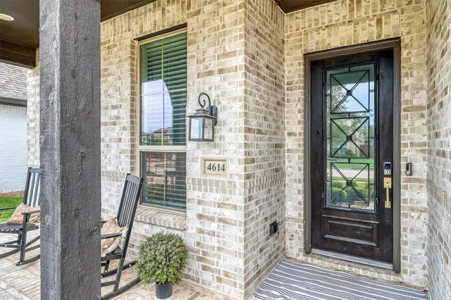 a view of balcony with wooden floor and fence