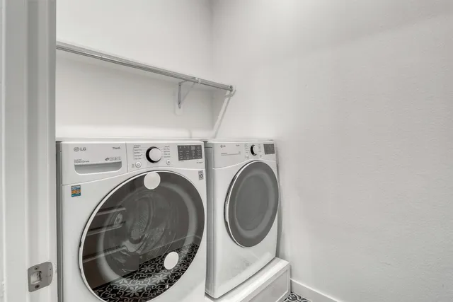 a storage room with washer and dryer