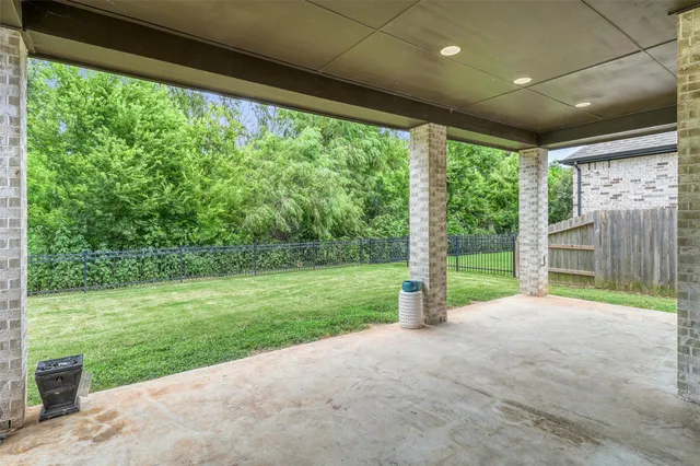 a view of entrance gate of the house