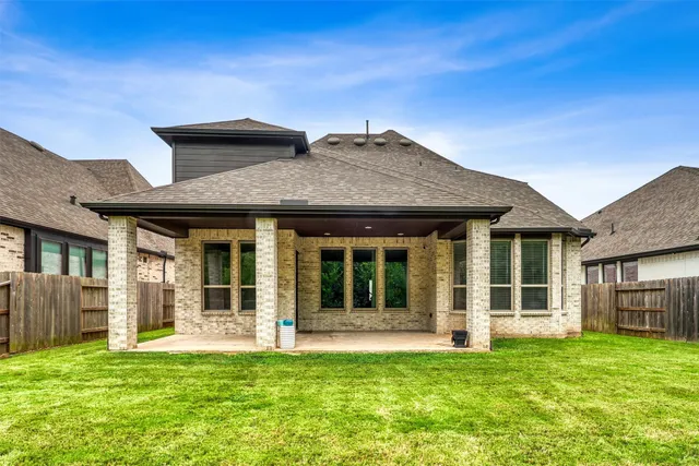 a view of a porch with a big yard