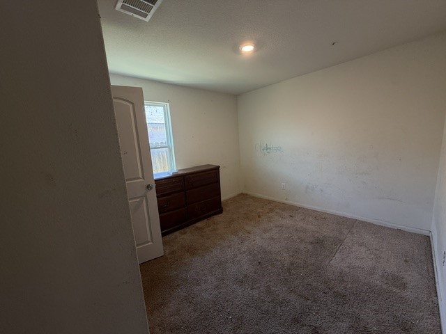 124 Niven Path Jarrell, TX 76537 - Photo 10 of 15 an empty room with windows
