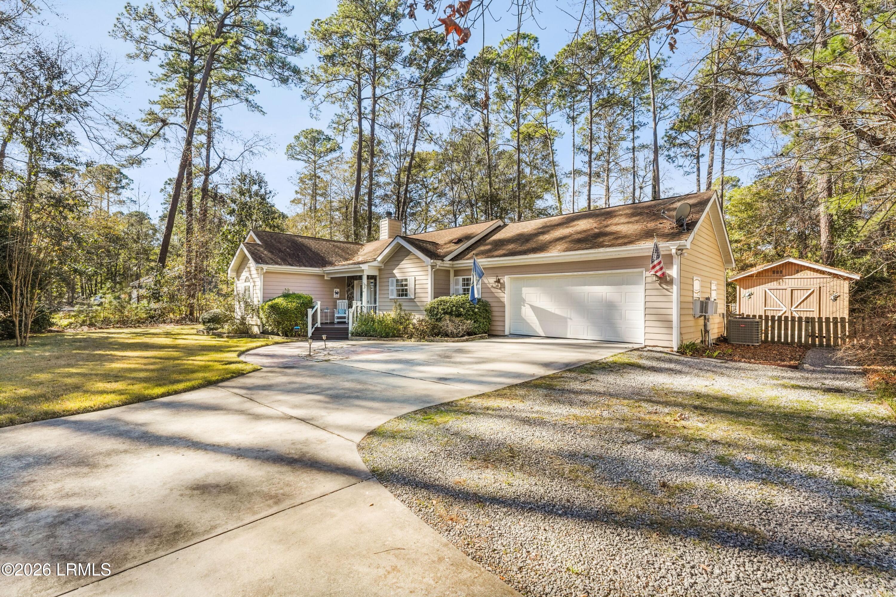 561 Sams Point Road Beaufort, SC 29907 - Photo 4 of 44 SIDE VIEW OF HOME
