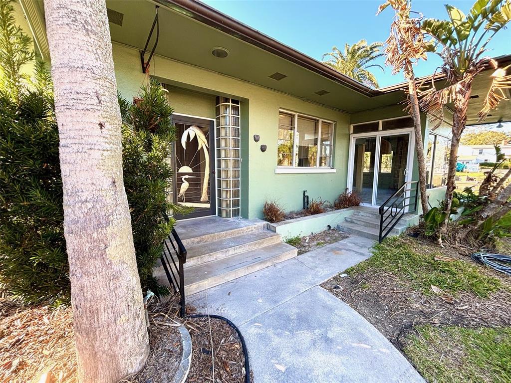 5329 Richey Drive New Port Richey, FL 34652 - Photo 1 of 1 a front view of a house with garden