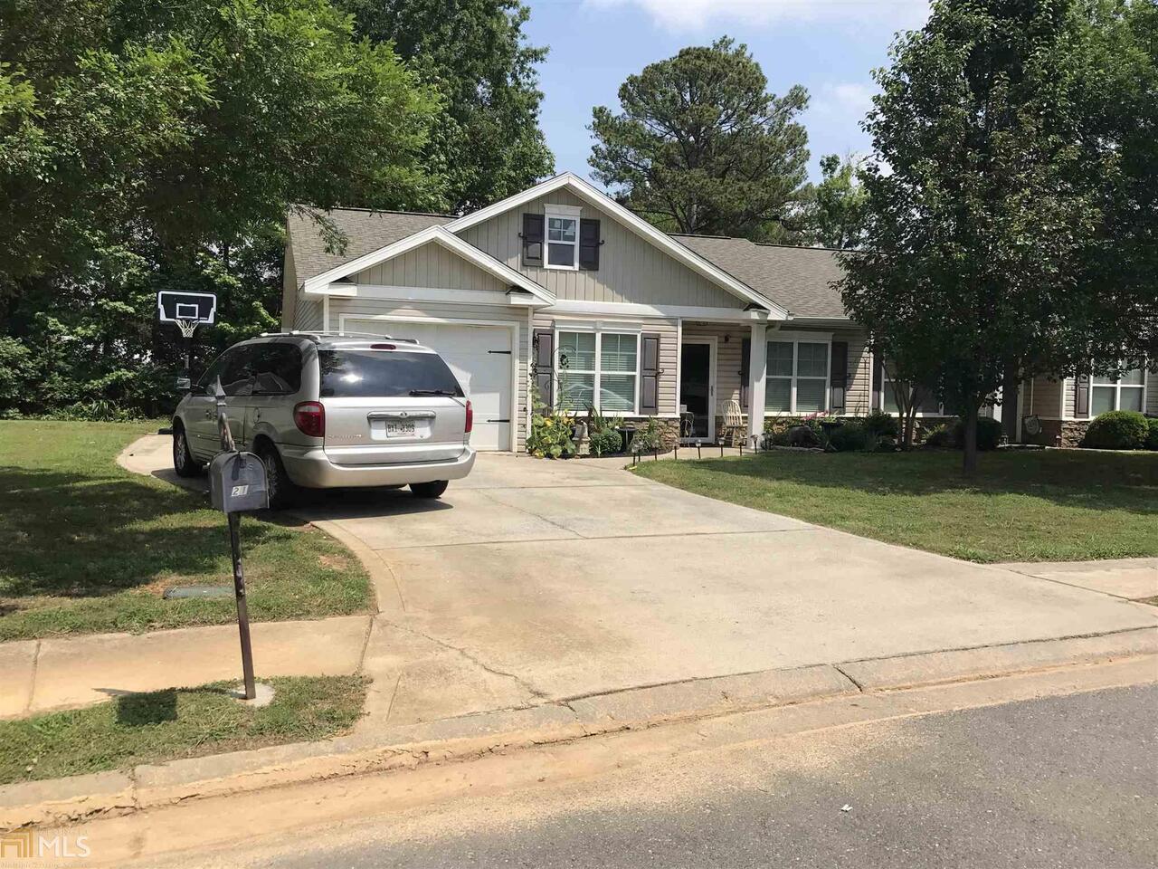 21 Brookstone Drive Northwest Rome, GA 30165 - Photo 1 of 1 a front view of a house with a garden