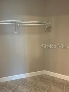 a view of a wall with racks on the wall