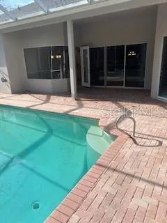 a view of a backyard of the house