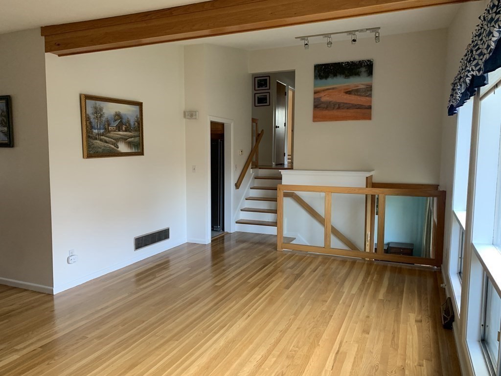 67 Joyce Road Framingham, MA 01701 - Photo 19 of 32 a view of entryway with wooden floor