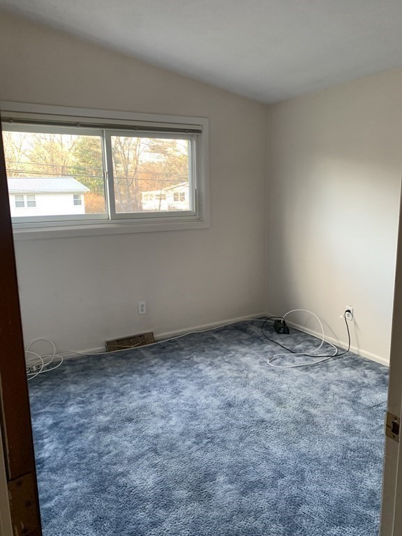 67 Joyce Road Framingham, MA 01701 - Photo 30 of 32 a view of a window in an empty room