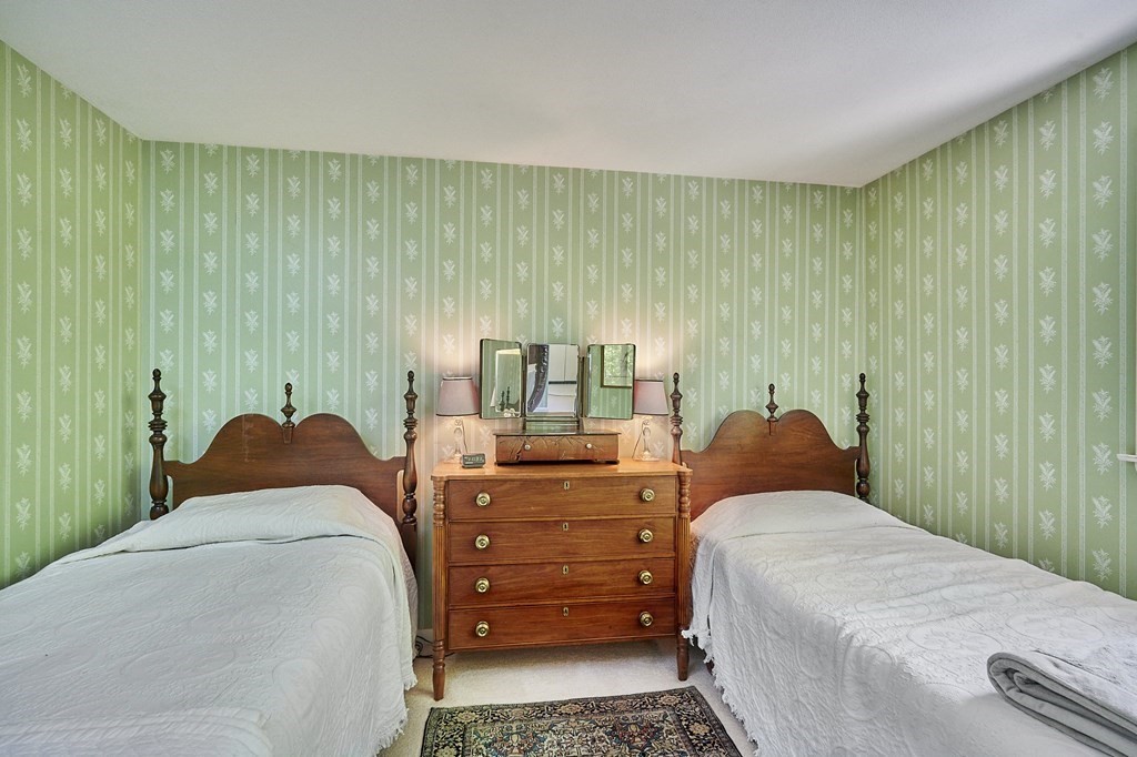 64 Cushman Road Shutesbury, MA 01002 - Photo 20 of 41 a bedroom with a bed and a window