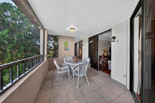a dining room with furniture and outdoor space