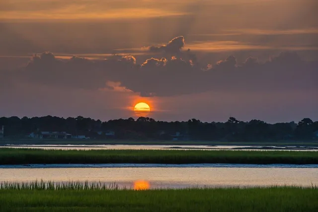 a view of a lake with a city