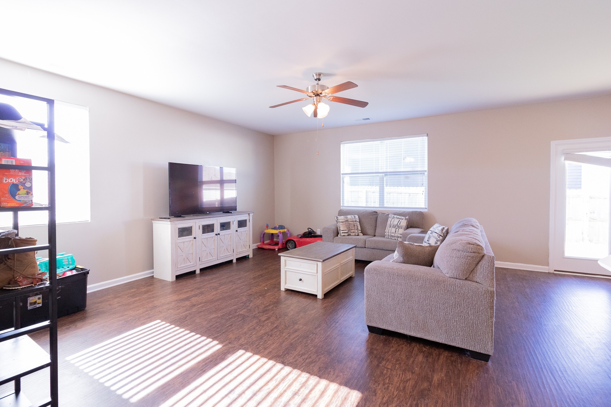 753 Prominence Road Columbia, TN 38401 - Photo 11 of 37 a living room with furniture and a flat screen tv