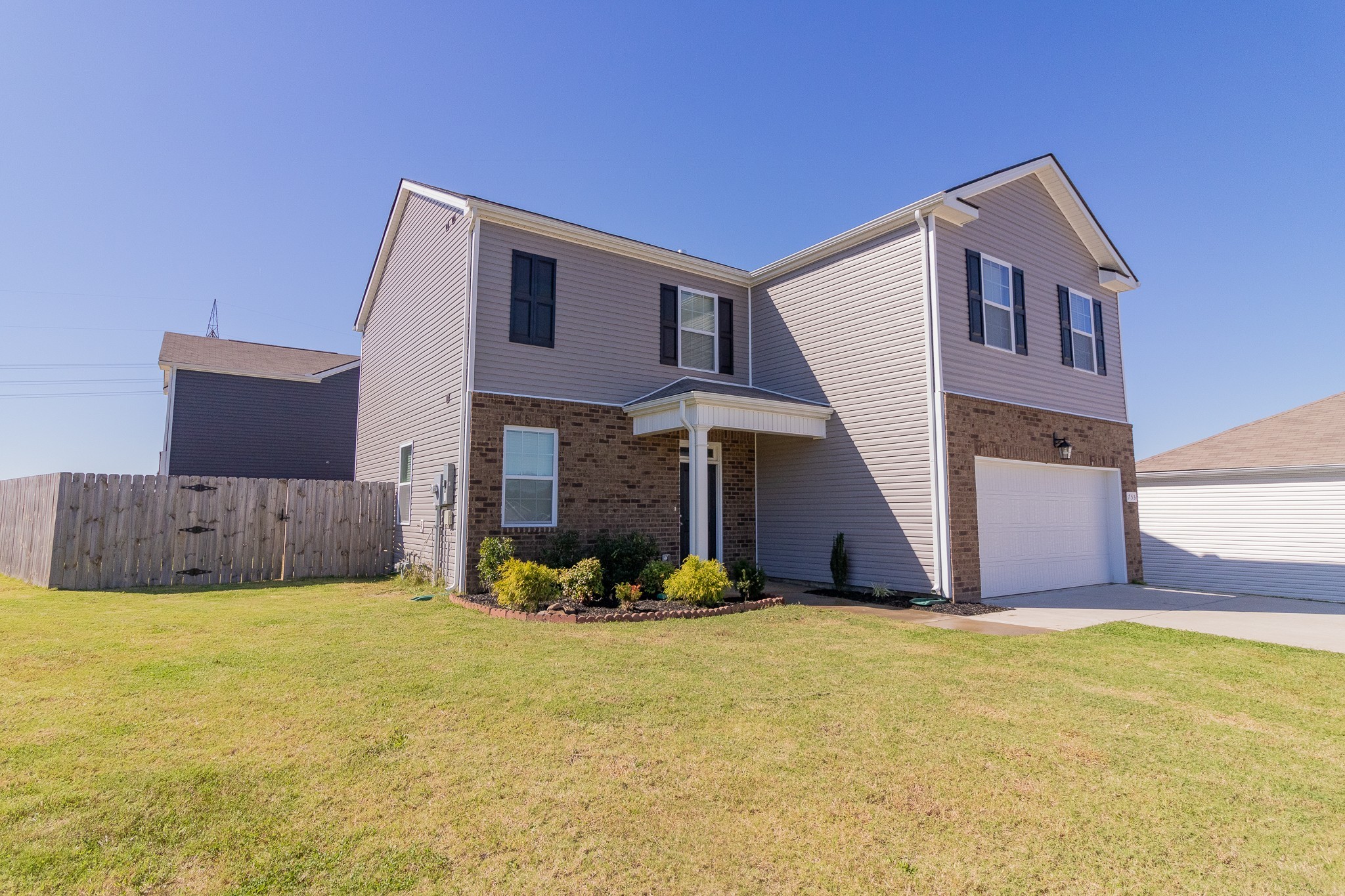753 Prominence Road Columbia, TN 38401 - Photo 3 of 37 a view of a house with a yard and garage