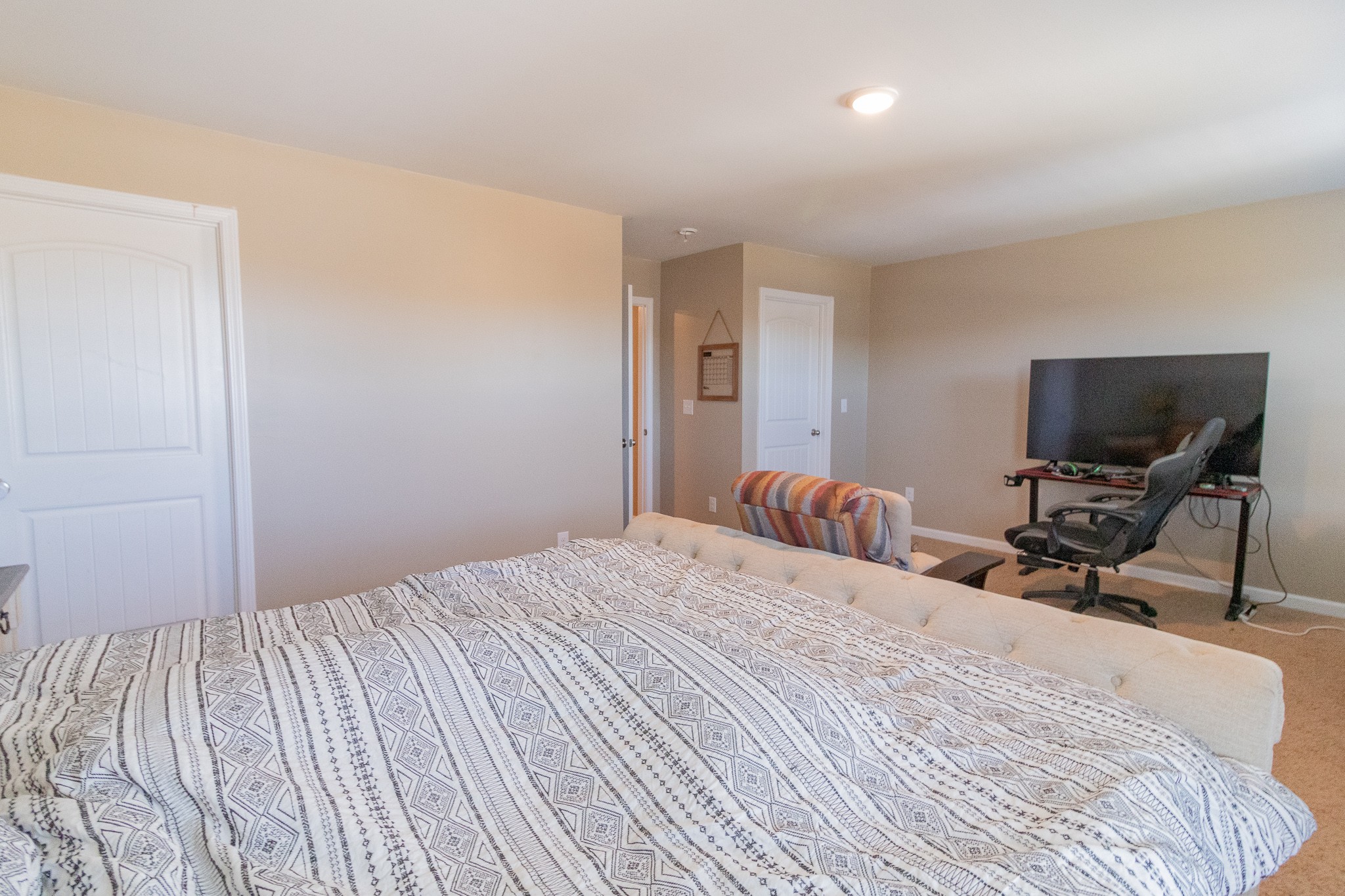 753 Prominence Road Columbia, TN 38401 - Photo 22 of 37 a bedroom with a bed and a chair
