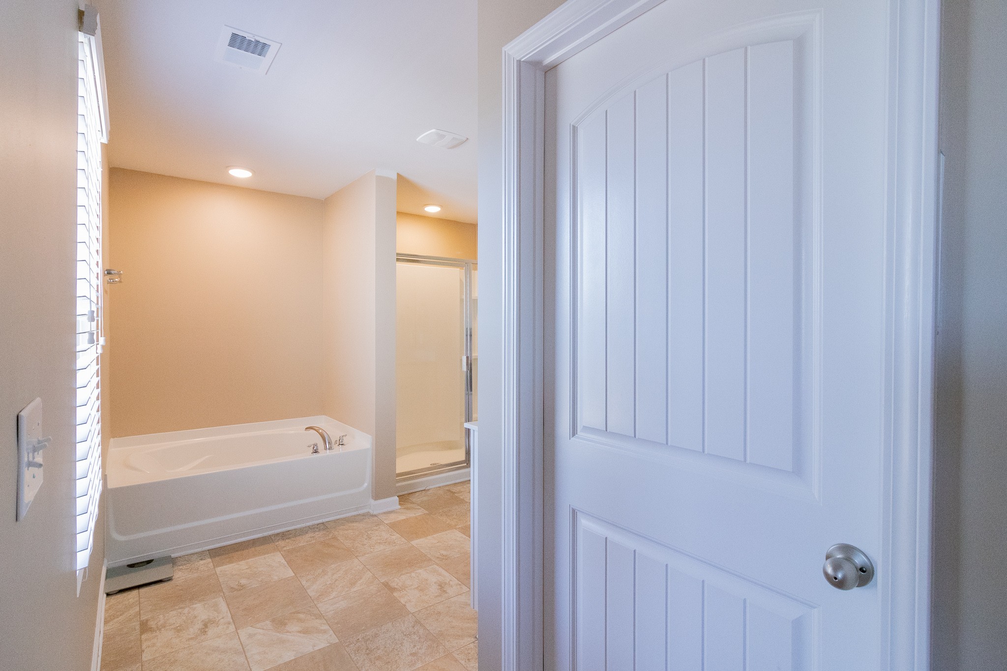 753 Prominence Road Columbia, TN 38401 - Photo 23 of 37 a bathroom with a bathtub and shower