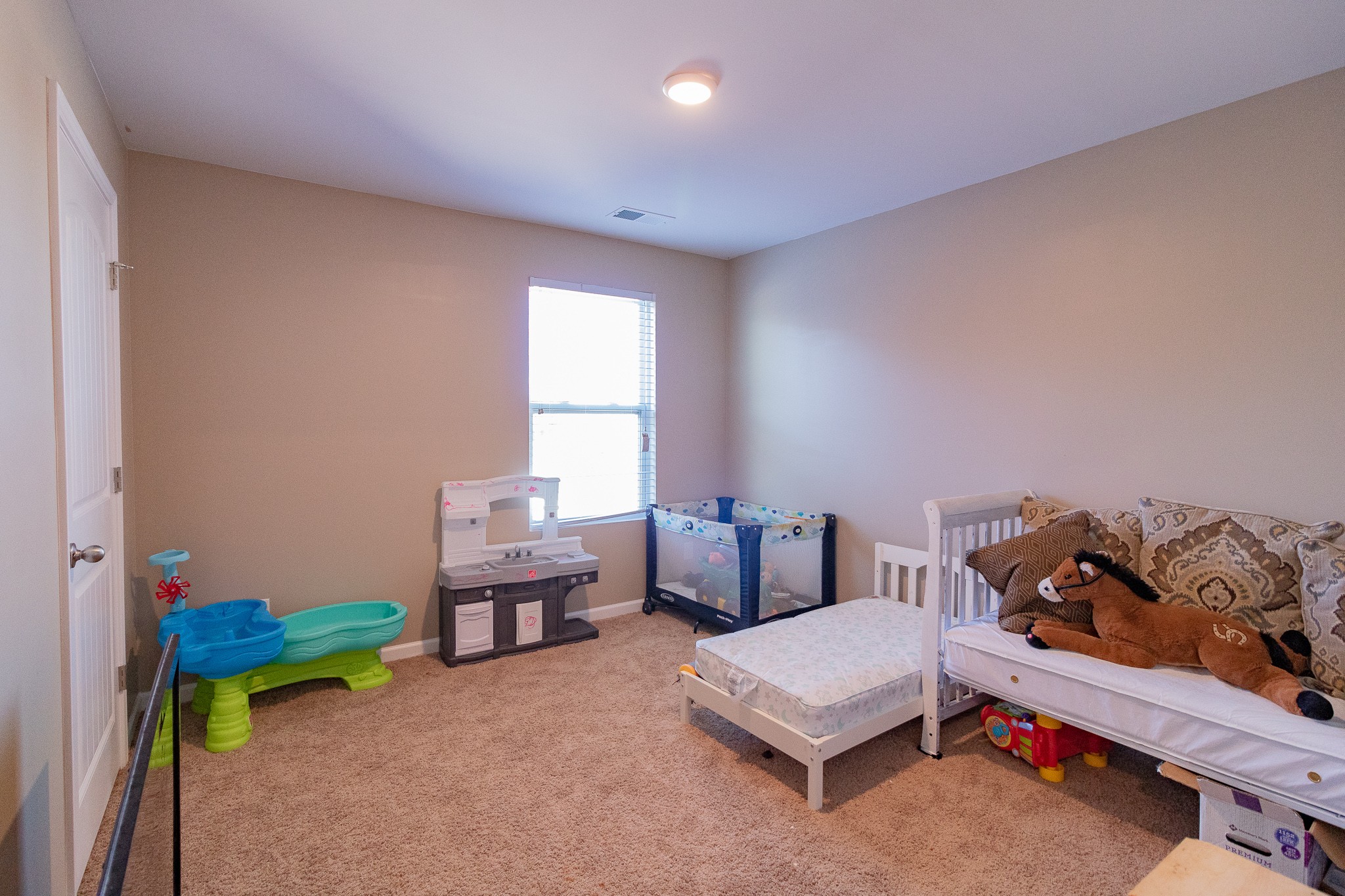 753 Prominence Road Columbia, TN 38401 - Photo 28 of 37 a bedroom with furniture and a window