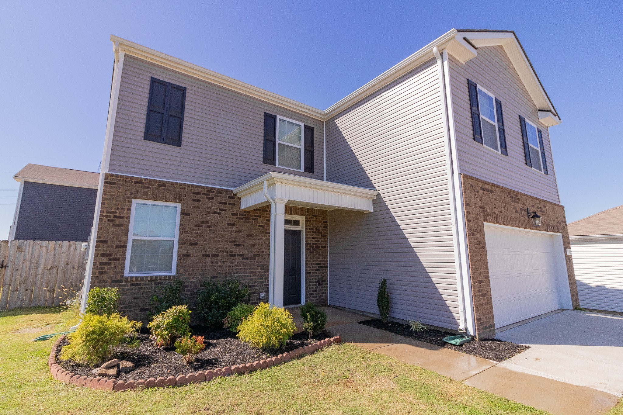 753 Prominence Road Columbia, TN 38401 - Photo 4 of 37 a front view of a house with a yard