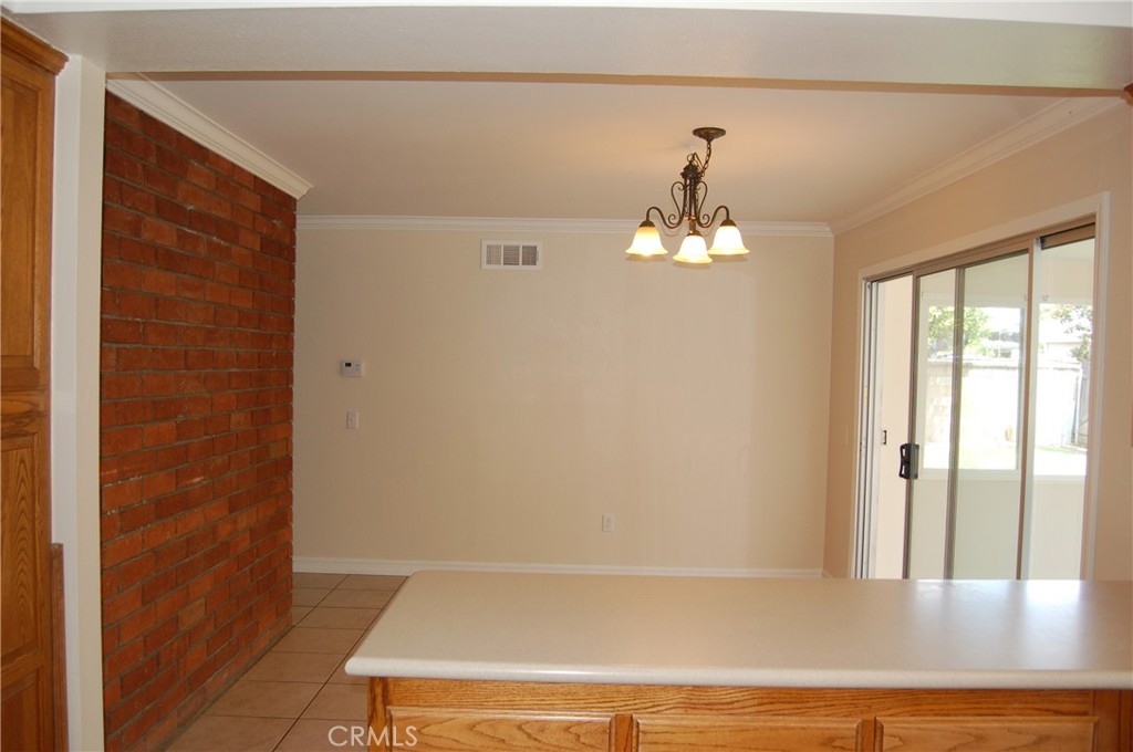 8484 Monteel Place Riverside, CA 92504 - Photo 11 of 34 a view of a room with window and stairs