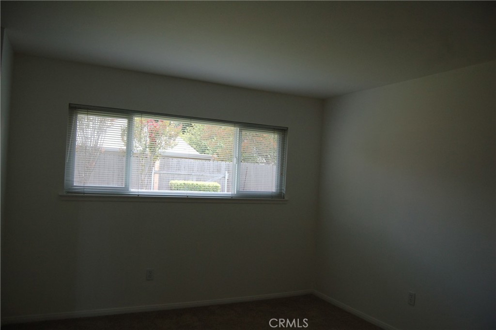 8484 Monteel Place Riverside, CA 92504 - Photo 16 of 34 a close up of a wall with a window