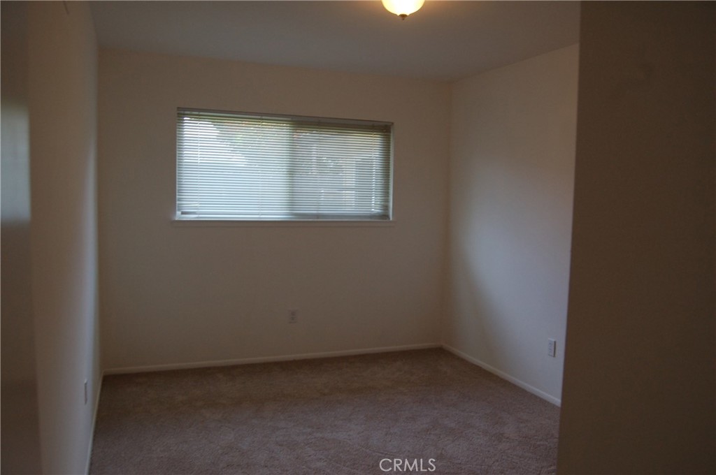 8484 Monteel Place Riverside, CA 92504 - Photo 23 of 34 an empty room with a window