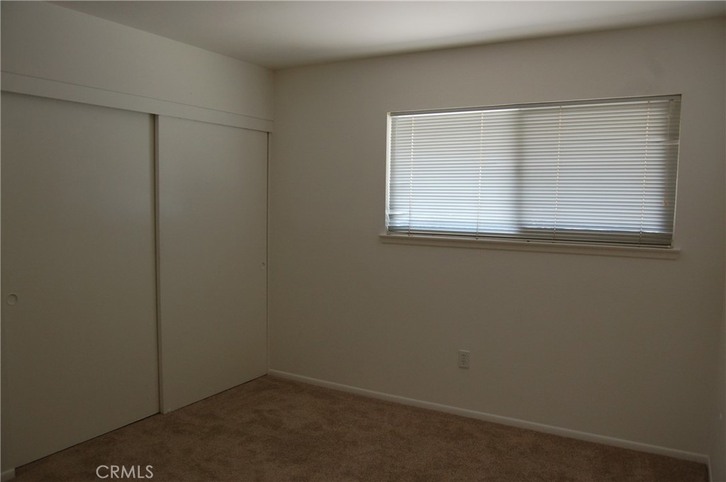 8484 Monteel Place Riverside, CA 92504 - Photo 24 of 34 an empty room with a window