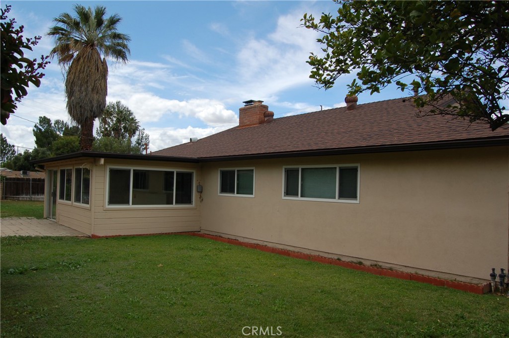8484 Monteel Place Riverside, CA 92504 - Photo 25 of 34 a house that has a tree in front of the house