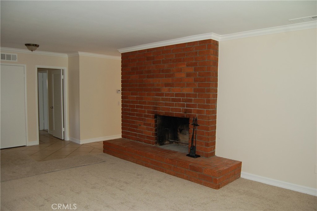8484 Monteel Place Riverside, CA 92504 - Photo 7 of 34 a living room with furniture