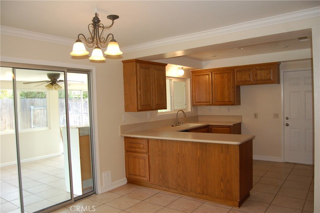 8484 Monteel Place Riverside, CA 92504 - Photo 9 of 34 a bathroom with a sink a mirror and a shower