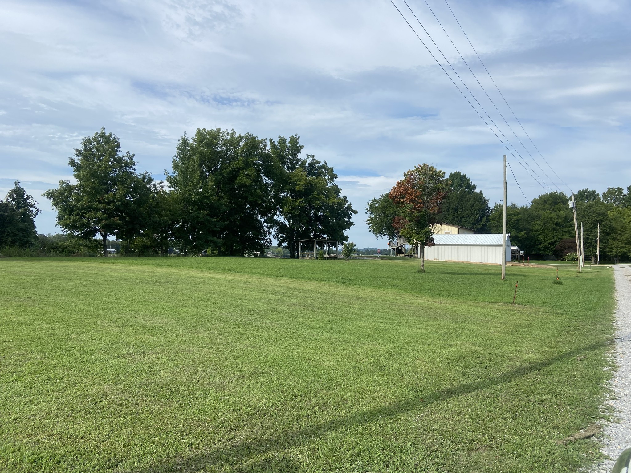 0 Yarbro Landing Lane Decaturville, TN 38329 - Photo 2 of 9 a garden with trees in the background